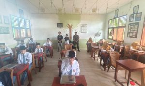 Wujudkan Generasi Emas, Koramil 06/Kateman Dampingi Distribusi Ribuan Porsi Makan Sehat Bergizi